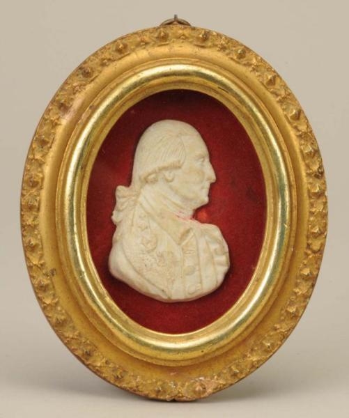 RELIEF OF GEORGE WASHINGTON IN GOLD FRAME.        