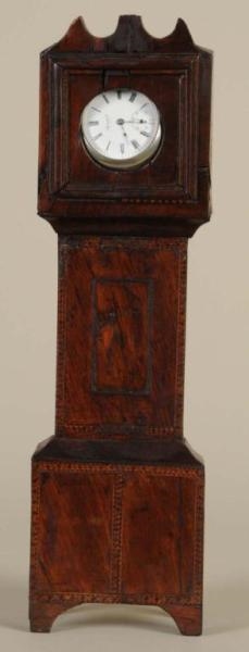 ENGLISH WATCH HUTCH IN THE FORM OF A TALL CLOCK.  