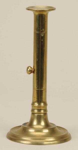 ENGLISH BRASS SIDE EJECTOR CANDLESTICK.           