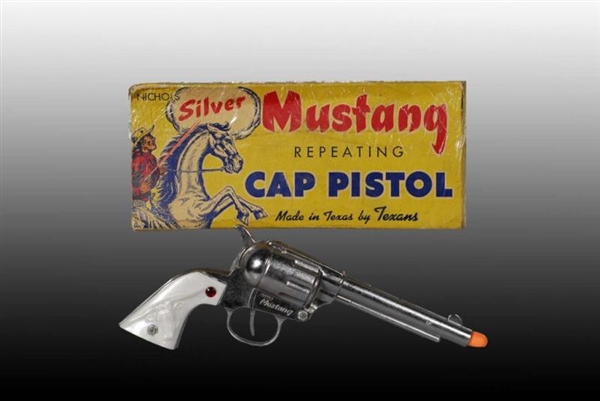 SILVER MUSTANG REPEATING TOY CAP GUN.             