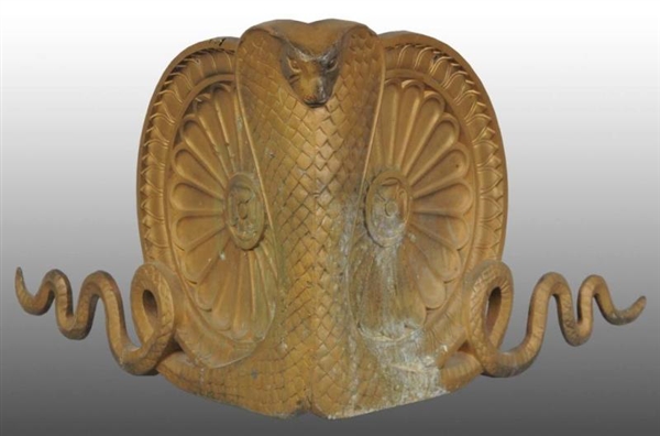 ARCHITECTURAL CAST IRON PIECE IN FORM OF COBRA.   