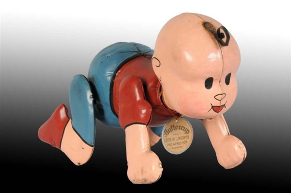 TIN CRAWLING BUTTERCUP WIND-UP TOY.               