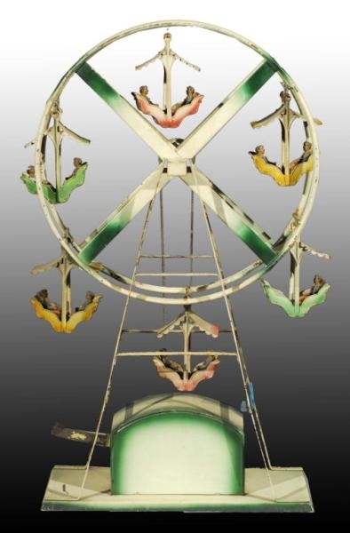 TIN DOLL COMPANY LEVER-ACTIVATED FERRIS WHEEL TOY.