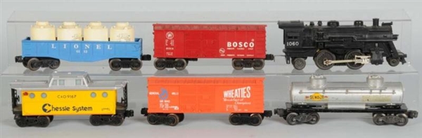 LOT OF 32: LIONEL O-GAUGE FREIGHT CARS.           