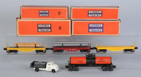 LOT OF 4: LIONEL FREIGHT CARS IN OB               