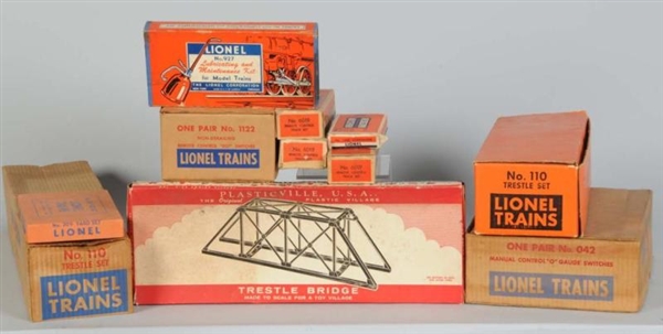 LARGE LOT OF LIONEL TRACK ACCESSORIES IN OB       