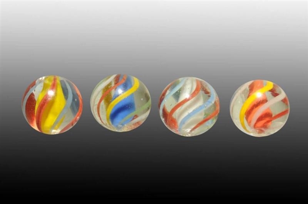 LOT OF 4: SOLID CORE MARBLES.                     