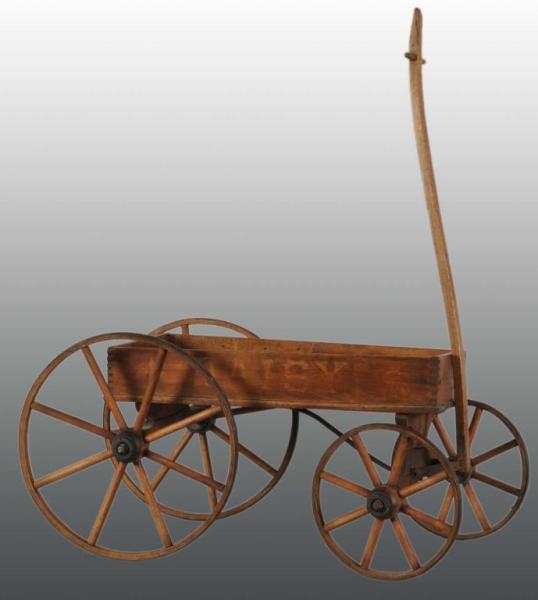 WOODEN DAISY WAGON WITH METAL WHEELS.             