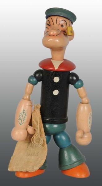 WOODEN JOINTED CHEIN POPEYE FIGURE.               