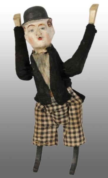 CHARLIE CHAPLIN WIND-UP TUMBLING TOY.             