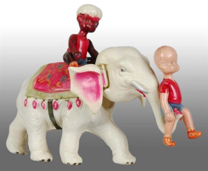 CELLULOID HENRY ON ELEPHANT WIND-UP TOY.          