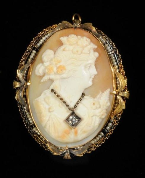 ANTIQUE 10K YELLOW GOLD CAMEO BROOCH.             