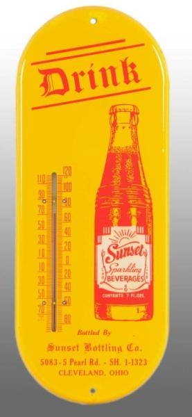 TIN SUNSET THERMOMETER WITH BOTTLE.               