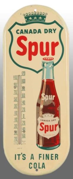TIN SPUR THERMOMETER BY CANADA DRY.               