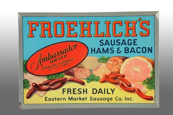 TIN OVER CARDBOARD FROEHLICHS MEATS SIGN.        