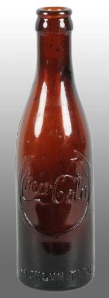 AMBER COCA-COLA BOTTLE FROM JACKSON, TENNESSEE.   