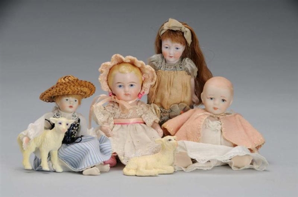 LOT OF 4: SMALL DOLLS WITH 2 LAMBS.               