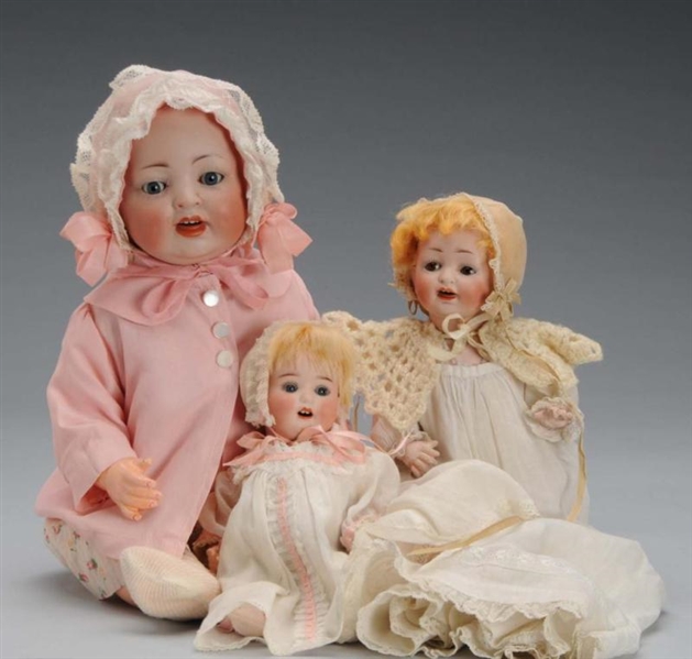 LOT OF 3: GERMAN BISQUE CHARACTER BABY DOLLS.     