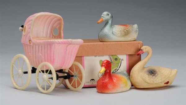  LOT OF CELLULOID DUCKS AND CARRIAGE.             