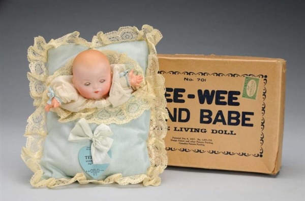 TEE-WEE HAND BABY THE LIVING DOLL.                
