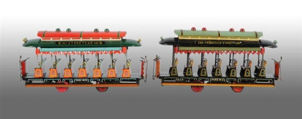 PAIR OF JAPANESE FRICTION TROLLEY CARS.           