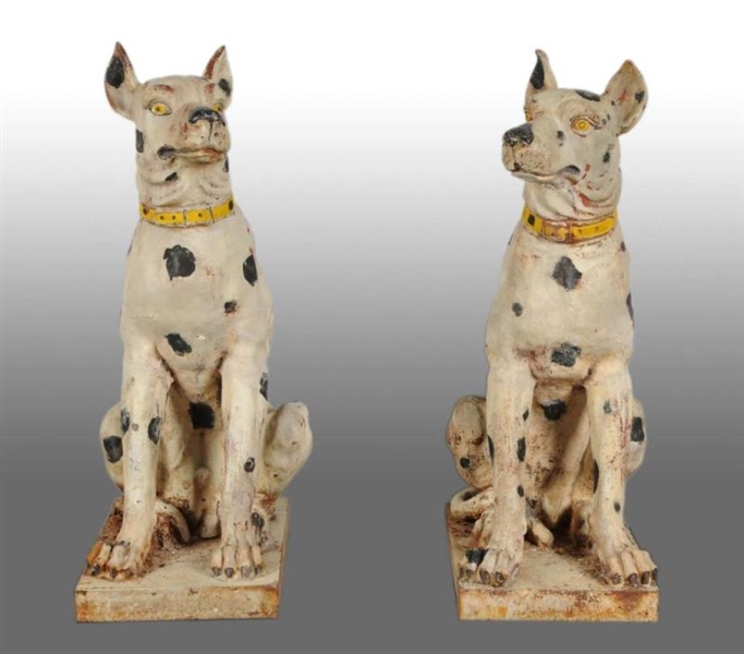 PAIR OF CAST IRON ORNAMENTAL LAWN DOGS.           