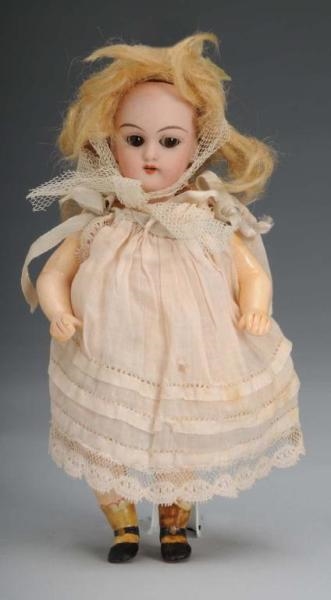 SMALL HANDWERCK CHILD WITH JOINTED KNEES DOLL     