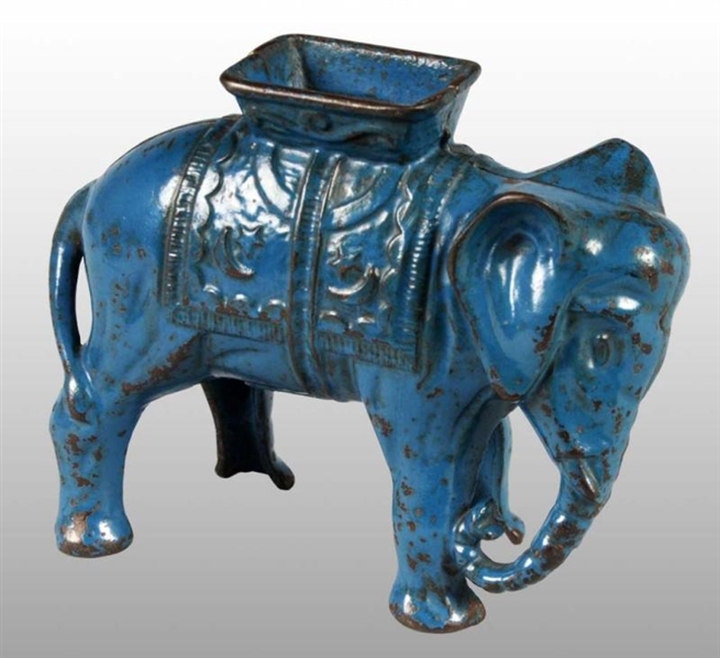 CAST IRON LARGE ELEPHANT WITH HOWDAH STILL BANK.  