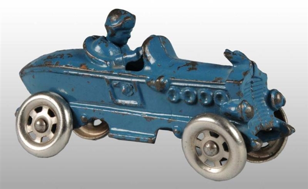 CAST IRON AC WILLIAMS BOAT TAIL RACE CAR TOY.     