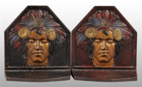 LOT OF 2: CAST IRON INDIAN BOOKEND PAIRS.         