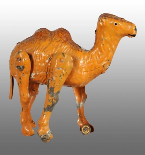 TIN HAND-PAINTED CAMEL WIND-UP TOY.               
