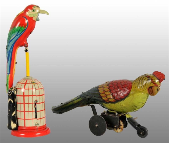 LOT OF 2: TIN LITHO PARROT WIND-UP TOYS.          