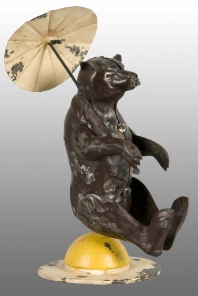 TIN HAND-PAINTED BEAR WIND-UP TOY.                