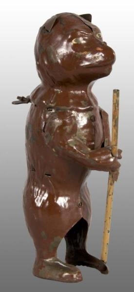 TIN HAND-PAINTED BEAR WITH POLE WIND-UP TOY.      