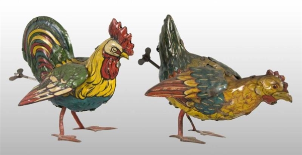LOT OF 2: TIN LITHO ROOSTER WIND-UP TOYS.         