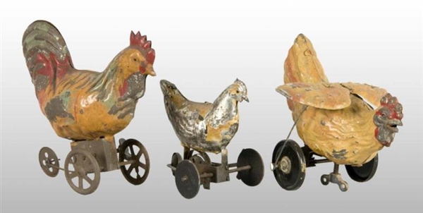 LOT OF 3: TIN HAND-PAINTED ROOSTER TOYS.          