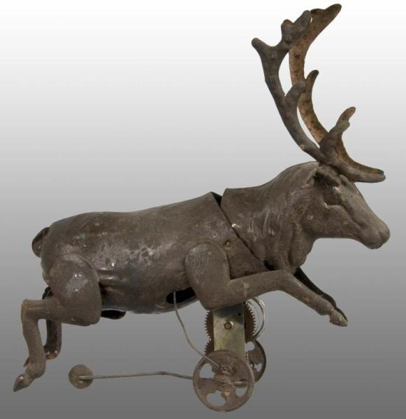 TIN STAG WIND-UP TOY.                             