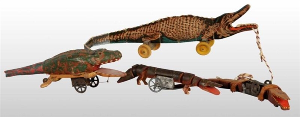 LOT OF 4: EARLY ALLIGATOR TOYS.                   