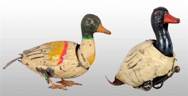 LOT OF 2: TIN HAND-PAINTED DUCK WIND-UP TOYS.     