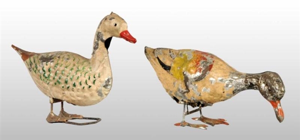 LOT OF 2: TIN HAND-PAINTED DUCK TOYS.             