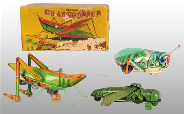 LOT OF 3: GRASSHOPPER WIND-UP TOYS.               