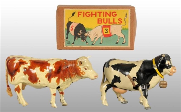 LOT OF 3: TIN BULL & COW WIND-UP TOYS.            