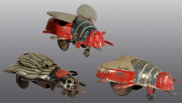 LOT OF 3: TIN HAND-PAINTED & LITHO FLY TOYS.      
