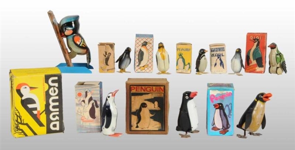 LOT OF 9: TIN PENGUIN & WOODPECKER WIND-UP TOYS.  