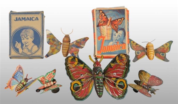 LOT OF 7: TIN BUTTERFLY WIND-UP TOYS.             