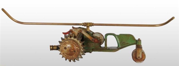 CAST IRON TRACTOR LAWN SPRINKLER.                 