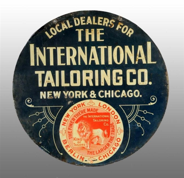 EMBOSSED TIN INTERNATIONAL TAILORING COMPANY SIGN.
