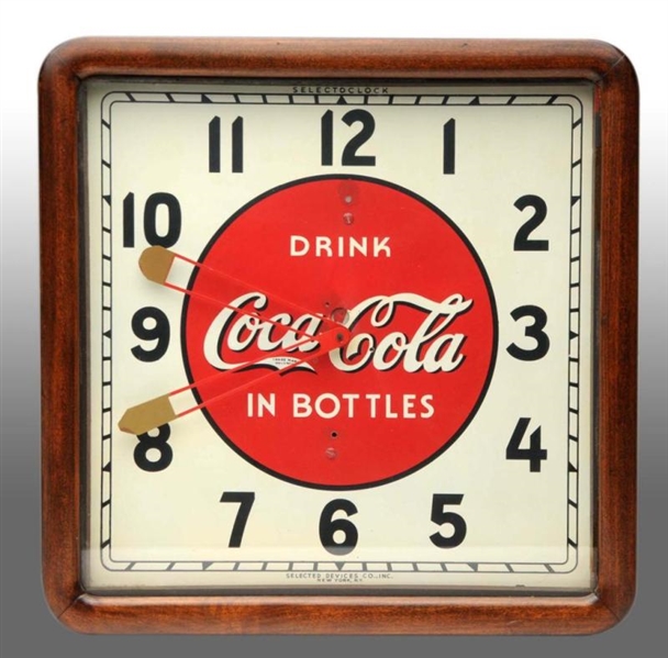 COCA-COLA ELECTRIC CLOCK BY SELECTED DEVICES.     