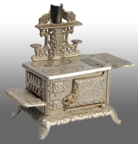 CAST IRON EAGLE TOY CHILDRENS STOVE.             