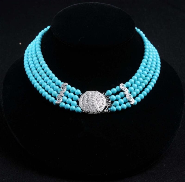 4-STRAND TURQUOISE NECKLACE.                      